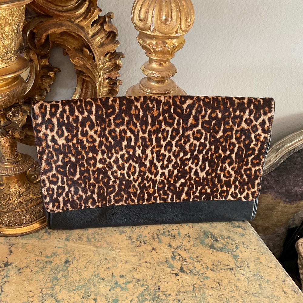 Mark and Graham black leather clutch with leopard print cowhide detail